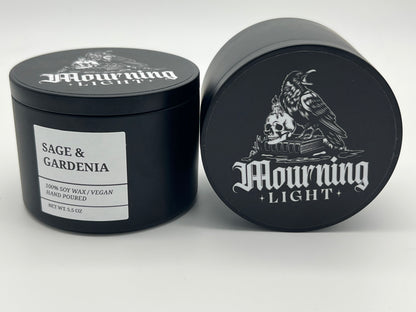 Black candle tin with Sage & Gardenia scent.